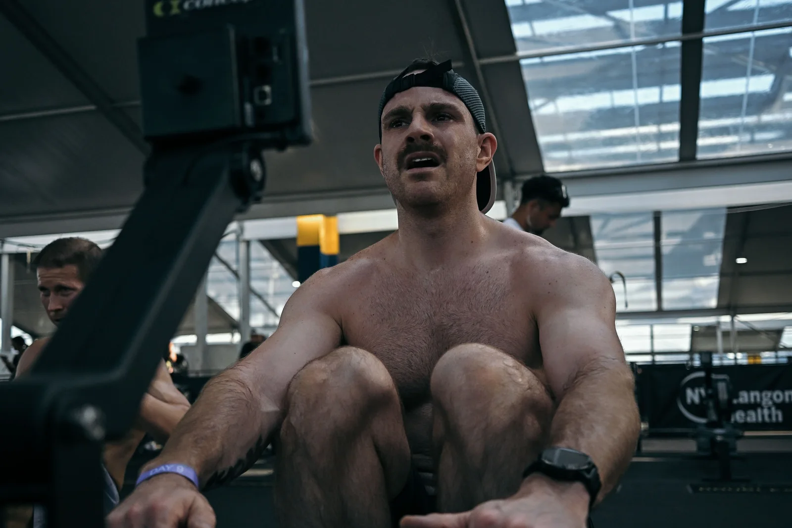 Storm Wilson rowing during a HYROX race